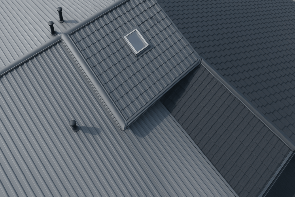 Aerial view of a roof showing separate roof planes and both shingle and metal sections